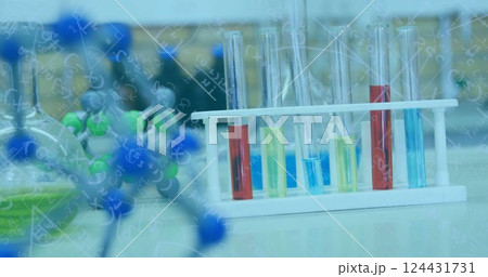 Image of mathematical equations over equipment in lab 124431731