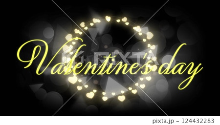 Valentine's Day text image with glowing heart shapes on dark background Valentine's Day text image with glowing heart shapes on dark background 124432283