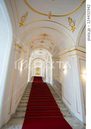 Interior of Bratislava Castle. Stone staircase and red carpet. Slovakia Interior of Bratislava Castle. Stone staircase and red carpet. Slovakia 124432942