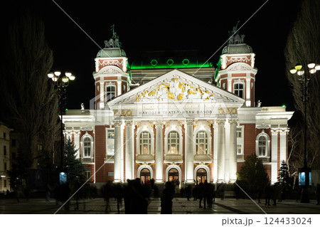 National Theatre Ivan Vazov building is brightly illuminated and stands out against evening sky 124433024