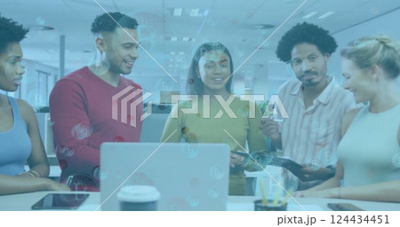 Image of financial data processing over diverse business people in office Image of financial data processing over diverse business people in office 124434451