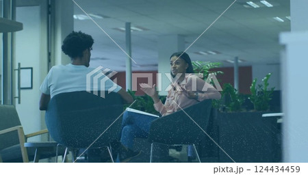 Image of financial data processing over diverse business people in office Image of financial data processing over diverse business people in office 124434459