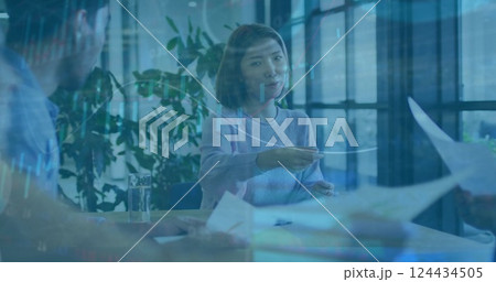 Image of financial data processing over diverse business people in office 124434505