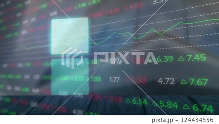 Image of financial data processing over office building 124434556