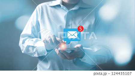 Business people touch on email in virtual screen. Inbox receiving electronic message alert. New email notification concept for business e-mail communication and digital marketing. campaign online. Business people touch on email in virtual screen. Inbox receiving electronic message alert. New email notification concept for business e-mail communication and digital marketing. campaign online. 124435107