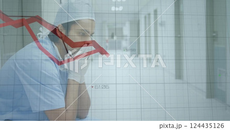 Image of diagrams over caucasian male doctor sitting in hospital Image of diagrams over caucasian male doctor sitting in hospital 124435126