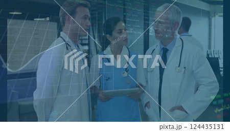 Image of diagrams and data processing over diverse doctors talking and using tablet Image of diagrams and data processing over diverse doctors talking and using tablet 124435131