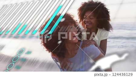 Image of data processing over african american mother and daughter on beach 124436129