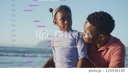 Image of data processing over african american father and daughter on beach 124436130