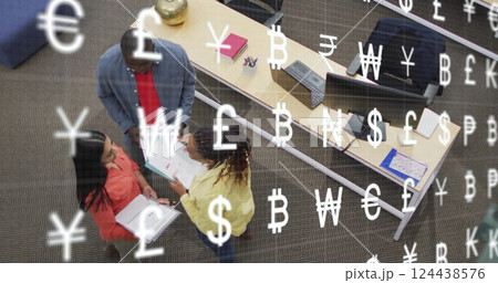 Image of currency symbols data processing over diverse business people in office Image of currency symbols data processing over diverse business people in office 124438576