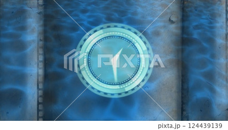 Image of clock moving fast over blue pattern background 124439139