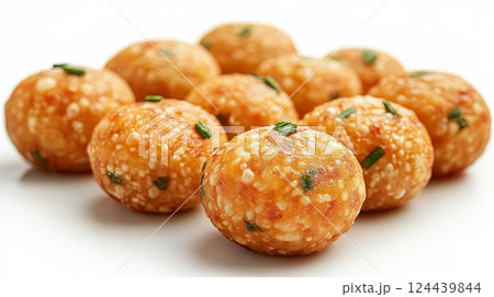 Close up view of boondi ladoo a traditional Indian sweet served during celebrations and festivals on a white background 124439844