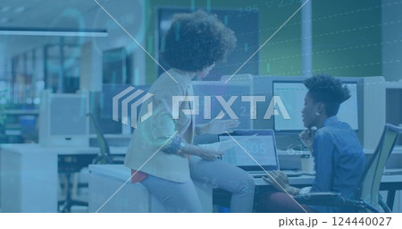 Image of financial data processing over diverse business people in office Image of financial data processing over diverse business people in office 124440027