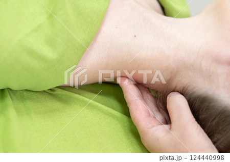 Caucasian woman on manual neck and head massage.  124440998
