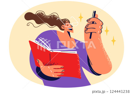 Smiling woman write in notebook 124441238