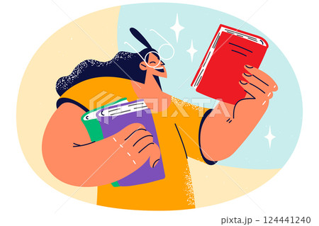Smiling girl in glasses holding books 124441240