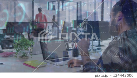 Image of financial data processing over caucasian businessman using computer in office Image of financial data processing over caucasian businessman using computer in office 124442000