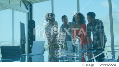 Image of people icons and data processing over diverse business people in office 124442228
