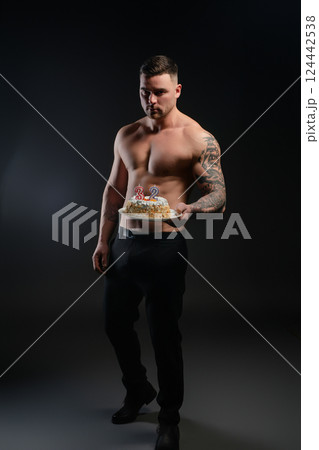 Celebrating a fitness birthday with a cake and tattoos in the spotlight 124442538