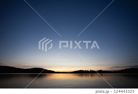 Sunset at calm Upper Saranac Lake 124443325