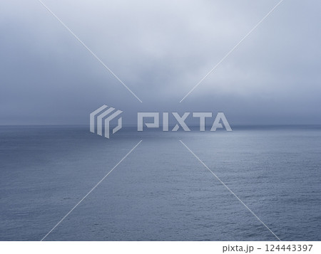 Storm clouds over calm sea 124443397