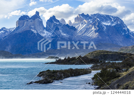 Clouds over Lake Pehoe and peaks of Torres Del Paine Clouds over Lake Pehoe and peaks of Torres Del Paine 124444018