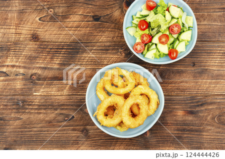 Deep-fried calamari rings. Deep-fried calamari rings. 124444426
