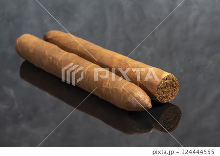Cigars on a dark background. Product for sale. 124444555