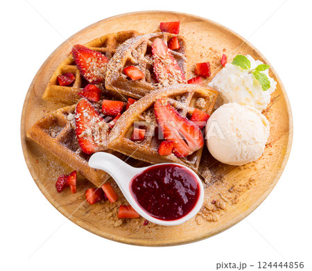 Strawberry waffles whit strawberry sauce and ice cream isolated on a white background. Strawberry waffles whit strawberry sauce and ice cream isolated on a white background. 124444856