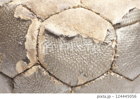 old leather soccer ball texture 124445056