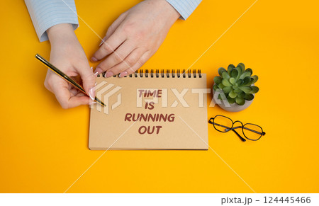 Notes with the word Time is running out. Expression used to indicate that there is little time remaining to complete something or to make a decision. Lifestyle and planning life concept Notes with the word Time is running out. Expression used to indicate that there is little time remaining to complete something or to make a decision. Lifestyle and planning life concept 124445466
