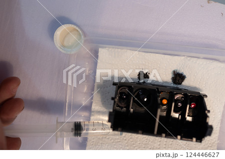cleaning the printer's print head 124446627