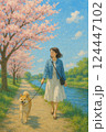 桜土手を犬と散歩する女性 124447102