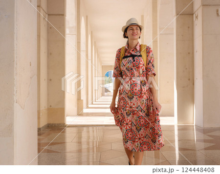 Young female tourist exploring iconic landmarks of the United Arab Emirates. 124448408