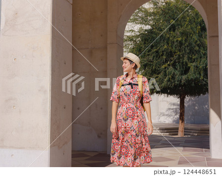 Young female tourist exploring iconic landmarks of the United Arab Emirates. 124448651