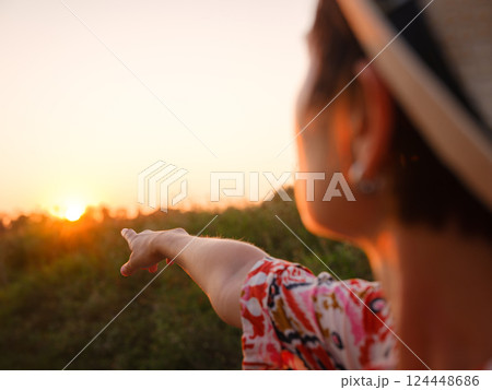 Warm sunset hues create peaceful, dreamy countryside atmosphere. Warm sunset hues create peaceful, dreamy countryside atmosphere. 124448686