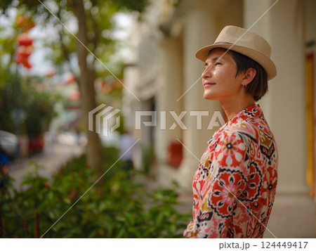 woman exploring streets of George Town, during Chinese New Year. woman exploring streets of George Town, during Chinese New Year. 124449417