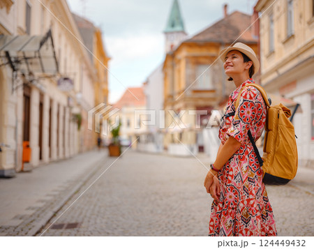 Woman Walking Through the Historic Center of Varazdin 124449432
