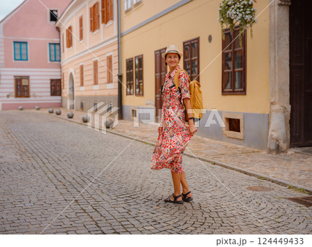 Woman Walking Through the Historic Center of Varazdin 124449433