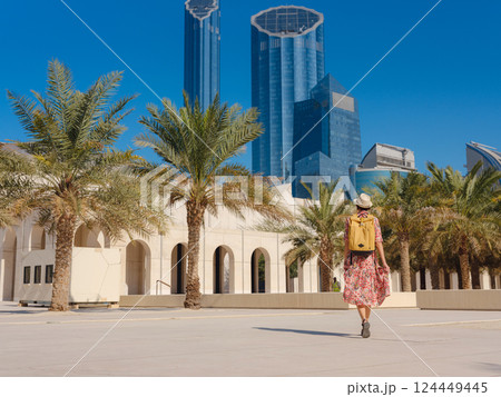Young female tourist exploring iconic landmarks of the United Arab Emirates. 124449445