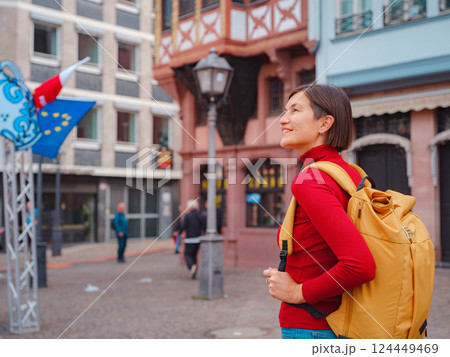 woman walks through old town of Frankfurt woman walks through old town of Frankfurt 124449469