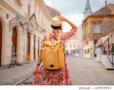Woman Walking Through the Historic Center of Varazdin 124449483