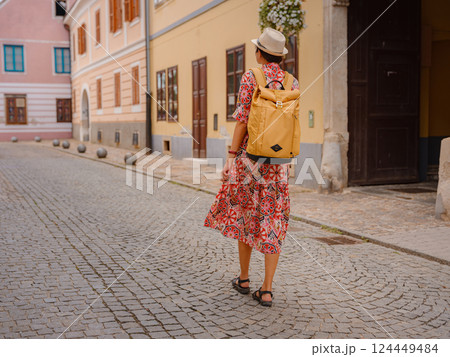 Woman Walking Through the Historic Center of Varazdin 124449484