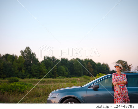 Traveler woman drives car through scenic countryside of Croatia 124449798