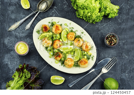 Delicious scallops with sauce. Delicious scallops with sauce. 124450457