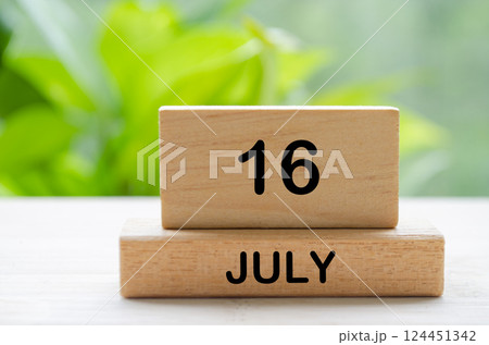 July 16th calendar text on wooden blocks with customizable space for text. Calendar concept. 124451342