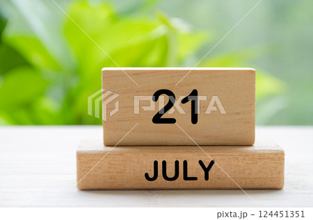 July 21th calendar text on wooden blocks with customizable space for text. Calendar concept. July 21th calendar text on wooden blocks with customizable space for text. Calendar concept. 124451351