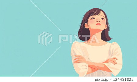 A thoughtful woman stands with arms crossed against a light blue background 124451823