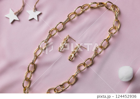 Handmade jewelry on a textile background. Gift for women. Bijouterie and jewellery for women. Handmade jewelry on a textile background. Gift for women. Bijouterie and jewellery for women. 124452936