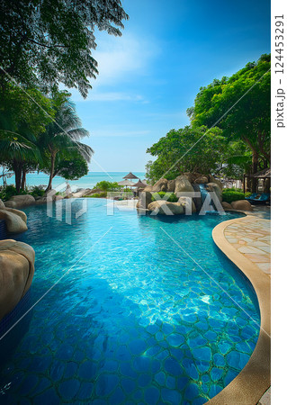 Inviting turquoise pool water sparkles under the sun at a luxury resort in pattaya, thailand, offering a tranquil escape with beach views Inviting turquoise pool water sparkles under the sun at a luxury resort in pattaya, thailand, offering a tranquil escape with beach views 124453291